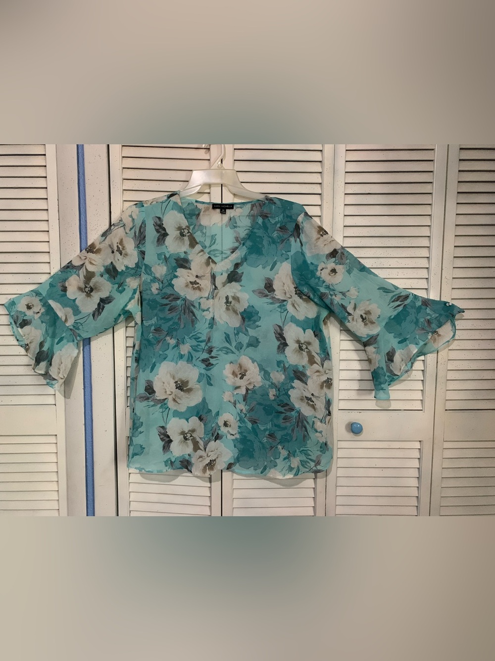 Sara Michelle Semi Sheer Turquoise Blouse With White Floral Print